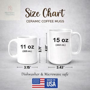 May include: Size chart for white ceramic coffee mugs. The image shows two mugs: an 11 oz (325 mL) mug, 8 cm wide and 9.4 cm tall, and a 15 oz (444 mL) mug, 8.7 cm wide and 11.7 cm tall. Dishwasher and microwave safe. Made in the USA.