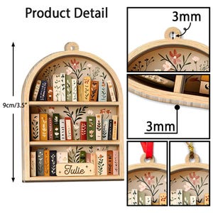 May include: Wooden bookshelf ornament with miniature books and floral accents. The ornament is 3.5 inches (9 cm) tall and features the name "Julie". The design includes a hanging loop and is 3mm thick.