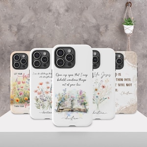 May include: A collection of white phone cases with floral designs and inspirational quotes. The cases feature various flower arrangements and text such as "Let your faith", "I can do all things", and "Open my eyes".