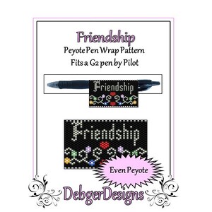 May include: A black pen with a beaded Friendship pen wrap pattern. The pattern includes the word "Friendship" in white, with colorful floral and heart accents. The design is for a G2 pen by Pilot.