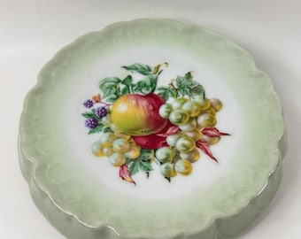Vintage pottery trivet, transferware fruit bouquet motif, early 20th century lithography, cottagecore  green fade crimped edge, 6.75"