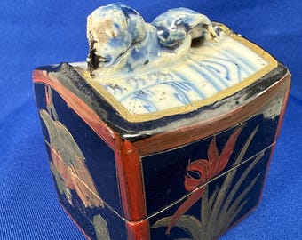 Vintage black lacquerware box with porcelain shard lid inlay