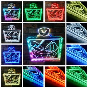 May include: A collection of LED light-up signs featuring a cartoon character with a menacing grin and sharp teeth. The signs have a rectangular shape with a WiFi symbol on top and are illuminated in various colors, including green, red, and blue.