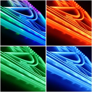 May include: A four-panel image showcasing a geometric design with vibrant LED lighting. Each panel displays the design in a different color: blue, orange, green, and a darker blue. The design features curved lines and a layered effect.