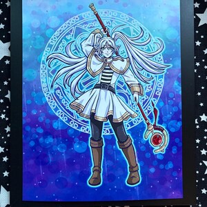 May include: Illustration of a character with long white hair, wearing a white and gold outfit, holding a staff with a red gem. The background is a blue gradient with a glowing circular design.