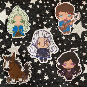May include: A collection of colorful chibi-style stickers featuring characters from a fantasy series. The stickers include a horse, a bard playing a lute, and several characters with swords and magic.