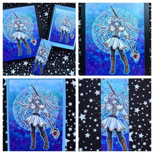 May include: Artwork of a female anime character with long white hair, wearing a white dress and holding a staff with a red gem. The background is a blue and purple design with a circular pattern. Available as prints and a bookmark.