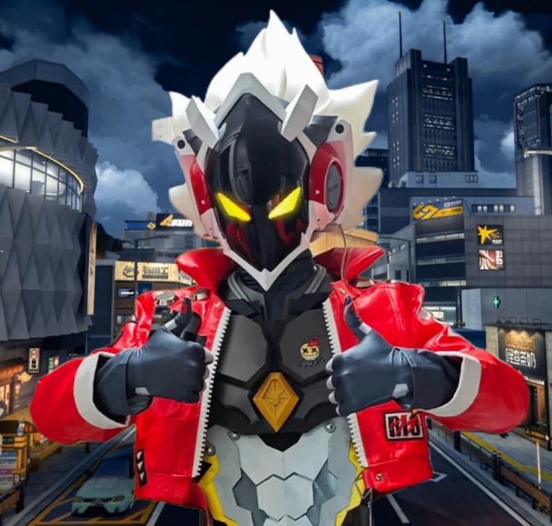 May include: A person in a futuristic robot costume with a red jacket, black gloves, and a helmet with white accents. The costume has a black face with yellow eyes and a silver chest plate. The person gives a thumbs-up.