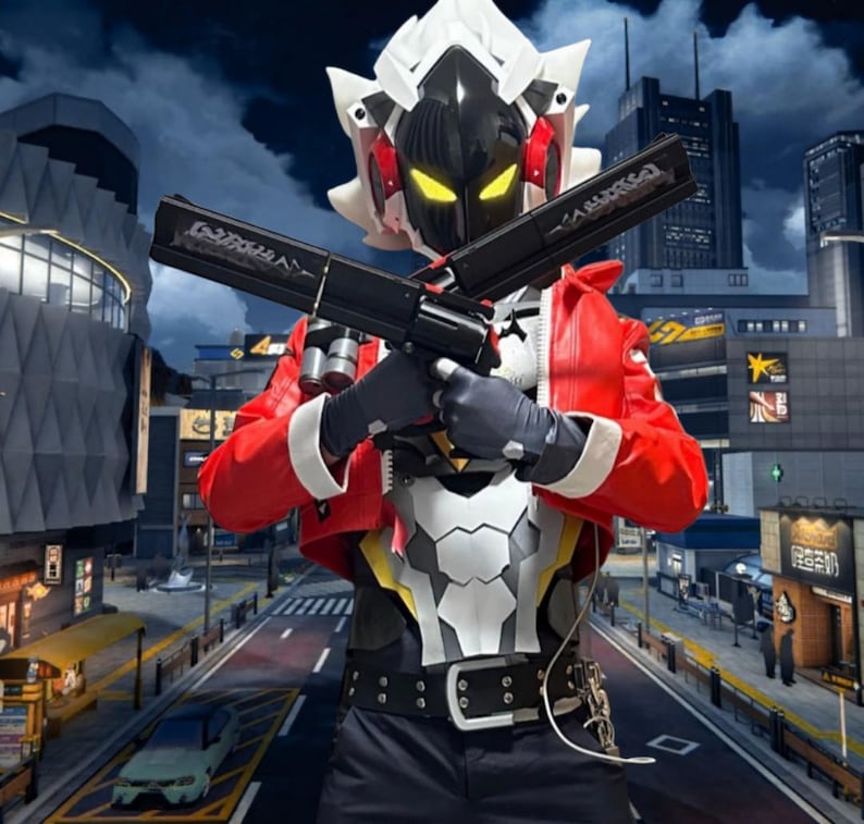 May include: A futuristic cosplay costume featuring a black and white helmet with yellow glowing eyes. The costume includes a red jacket, a white and black chest plate, and black pants. The person is holding two black toy guns with silver accents.