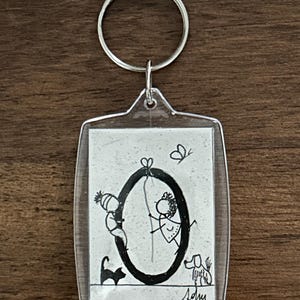 Porte-clés personnalisé avec initiale – Design original fait main dans une boîte en plastique