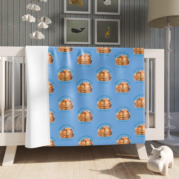 Nursery or Throw Blanket: Cozy, Resting Orange Cat Design