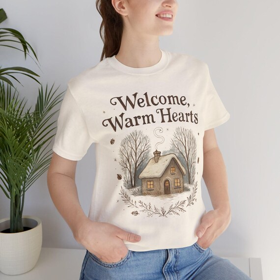 Welcome Warm Hearts cottage illustration T-Shirt | cozy winter home design
