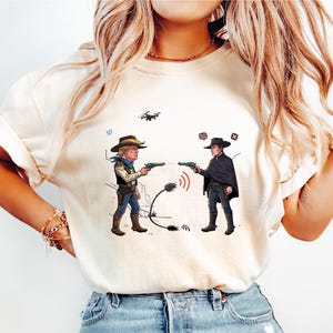 Grappig Elon Musk vs Donald Trump cartoon shirt, Elon vs Trump 2025 T-shirt, Trump vs Musk shirt, anti Trump cadeau, Trump vs Elon shirt
