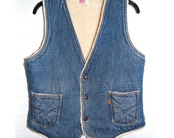 Jaqueta colete vintage Levi's, tamanho médio, etiqueta laranja, forro de sherpa, jeans estilo western.