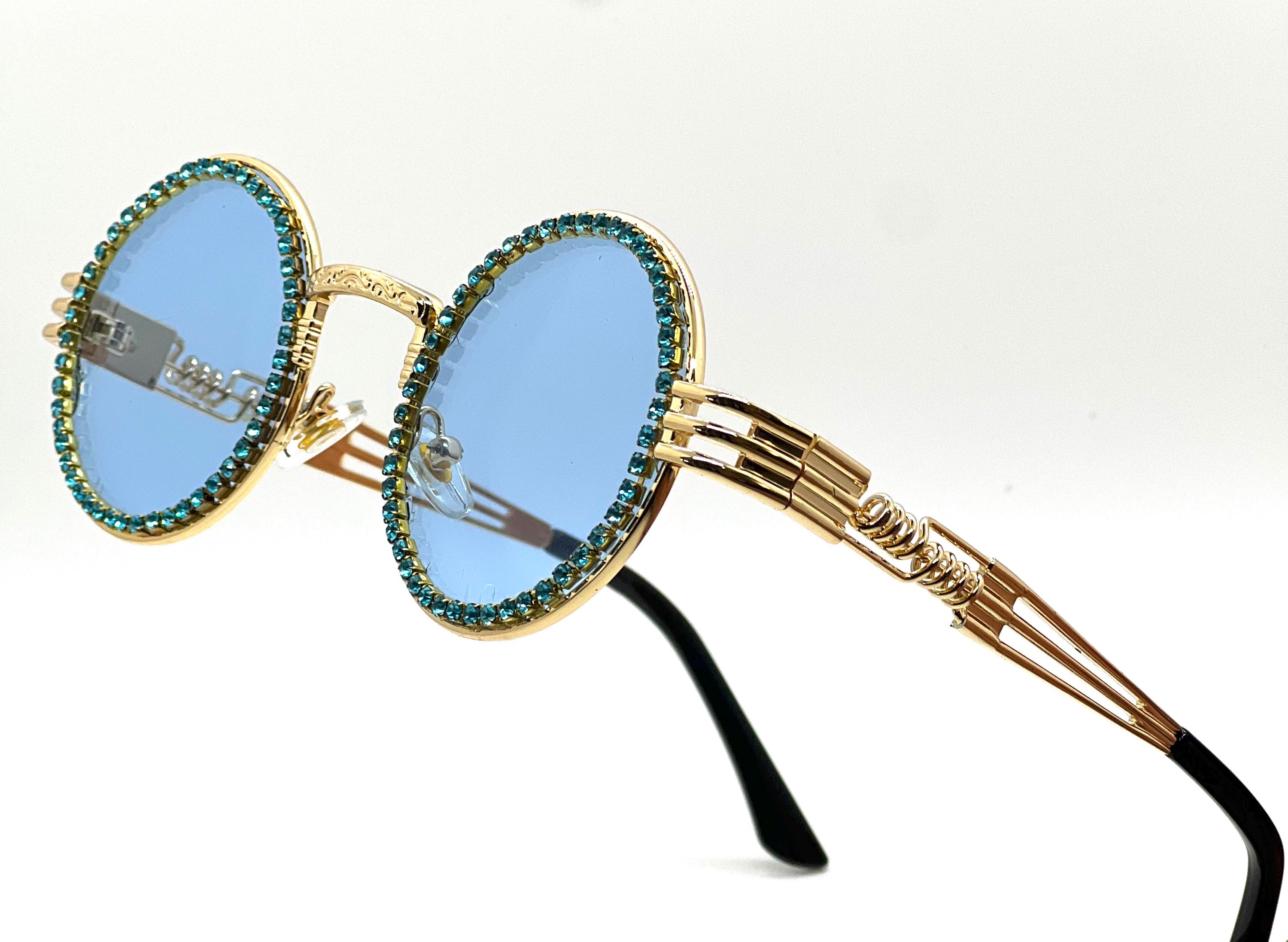 Large blue lens sunglasses gold trim futuristic Veiled Bright Gold Midnight Blue Female Shield Sunglasses  main image 4