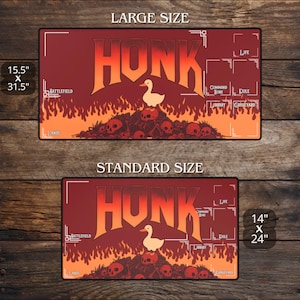May include: A red and orange playmat with the word "HONK" in large letters and a cartoon duck. The mat features a pile of skulls and flames, with areas labeled for gameplay. Available in 15.5" x 31.5" and 14" x 24" sizes.