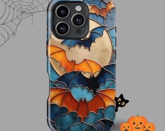 May include: A phone case featuring a Halloween design with bats, a full moon, and a stained-glass effect. The case has a blue, orange, and gold color scheme, with a black cat on top and a few jack-o'-lanterns at the bottom.