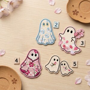 May include: Four embroidered ghost patches with floral patterns. One ghost has blue flowers, one holds a pink cherry blossom branch, one features a pink floral kimono-style design, and two smaller ghosts hold a pink flower. Numbered tiles 2, 3, 4, 5.