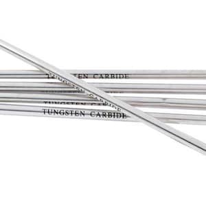 May include: Six silver pen refills with black rubber grips. The refills are labeled "TUNGSTEN CARBIDE".