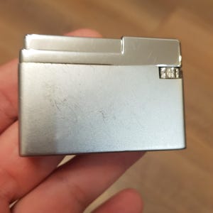 Vintage OLD 50s Silver Match Lighter Patent Compound