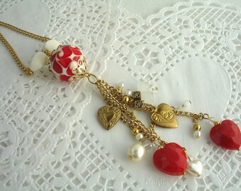 Long necklace with red and white lamp work bead and heart dangles, Valentines Day, heart tassel necklace
