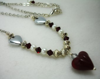 Red heart necklace, necklace with red lamp work heart and silver heart, Valentine jewelry