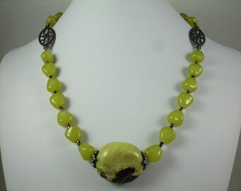 Necklace with stone focal, gunmetal accents and pistachio colored beads, green and black necklace