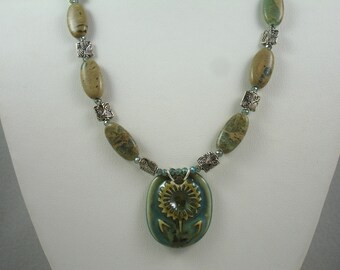 Necklace with ceramic floral pendant, green and beige necklace, ceramic and stone necklace