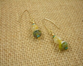 Simple beaded earrings on elliptical wires, gold plated, yellow and turquoise earrings