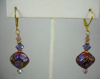 Earrings with multicolor lamp work beads and crystals, diamond shaped lamp work beads and Swarovski crystals on lever back wires