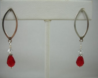 Sterling silver earrings with red crystal drops, oval shaped silver earrings with crystals on posts. red and silver earringsearrings