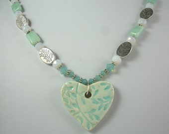 Ceramic heart pendant in green and white, green heart necklace, spring jewelry, Mother's Day gift