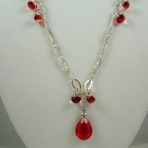 Necklace with red crystal pendant, teardrop shaped red crystal pendant on silver chain with red glass dangles, red and silver necklace