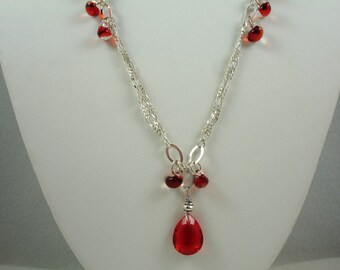 Necklace with red crystal pendant, teardrop shaped red crystal pendant on silver chain with red glass dangles, red and silver necklace