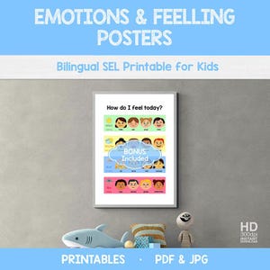 May include: A framed poster with the text "EMOTIONS & FEELING POSTERS" and "Bilingual SEL Printable for Kids." The poster displays various facial expressions representing different emotions. Below the poster are decorative items, including a plush shark and a small figurine.