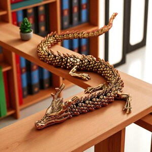 May include: A detailed bronze dragon figurine with a textured, scaled body and intricate facial features. The dragon is posed on a wooden shelf, with a small potted plant in the background. The dragon's color is a mix of gold and brown.