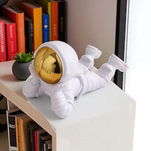 Adornos de escritorio de astronautas / Soporte para teléfono de astronauta para escritorio, decoración de oficina en casa / Figura de astronauta, estatua, decoración moderna para la habitación