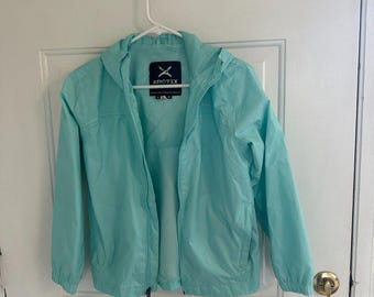 Jaqueta de chuva infantil com capuz Arctex na cor verde-água claro