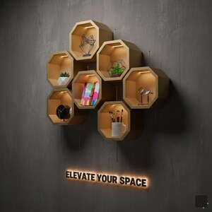 May include: A white ceramic mug with a black handle and the text "But First, Coffee" in a black, bold font. The mug is on a white surface.