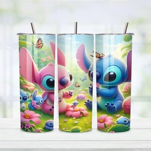 May include: Three stainless steel tumblers featuring a colorful cartoon illustration of Stitch and Angel in a garden setting. The design includes pink and blue characters, flowers, butterflies, and a straw.