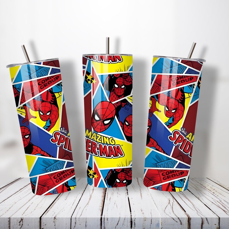 May include: Three stainless steel tumblers with lids and straws. Each tumbler features a colorful comic book design with the Amazing Spider-Man. The design includes the Spider-Man logo, comic book panels, and the words "COMIC GROUP".