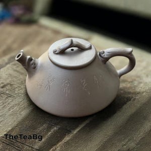 Yixing Zisha Teapot Retro Shi Piao Purple Clay Kung Fu Tea pot 180 ml Purple clay Stone ladle teapot