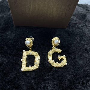 Dollec & Gabbana Gold Pearl DG Dangle Drop Earrings