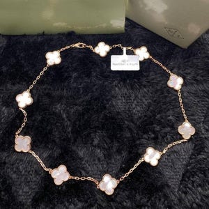 Van Cleef & Arpels 18k Gold Curb White Motif Chain Necklace