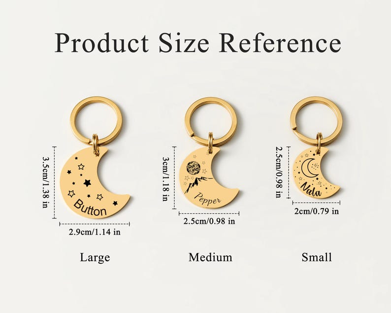 May include: Gold-colored crescent moon keychains in three sizes: large (2.9cm/1.14 in wide), medium (2.5cm/0.98 in wide), and small (2cm/0.79 in wide). Each keychain has a different design and name: Button, Pepper, and Nala.