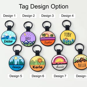 May include: Eight circular pet tags with different landscape designs. Each tag has a black loop and a name, like "Dexter" or "Daisy." The tags feature colourful backgrounds with mountains, sunsets, and rainbows. The text "Tag Design Option" is at the top.