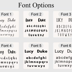May include: Image showing six font options, labelled Font 1 to Font 6. Each font option displays the words "Lucy Duke" and the alphabet. Font styles vary from cursive to bold, providing a range of choices for text design.