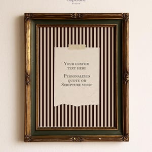 May include: A framed print with a vintage aesthetic. The frame is dark green and gold, surrounding a striped background with a torn paper element. The paper has text that reads "Your custom text here" and "Personalized quote or scripture verse."