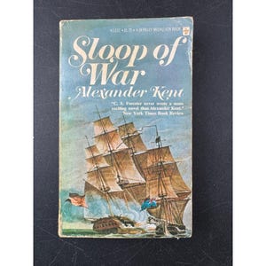 May include: A vintage paperback copy of "Sloop of War" by Alexander Kent. The cover art depicts sailing ships on a blue and white background. The book is a Berkley Medallion Book, with the price of $1.75.