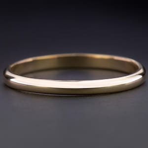 Brazalete redondo minimalista de plata, pulsera fina apilable, joyería clásica para el día a día.